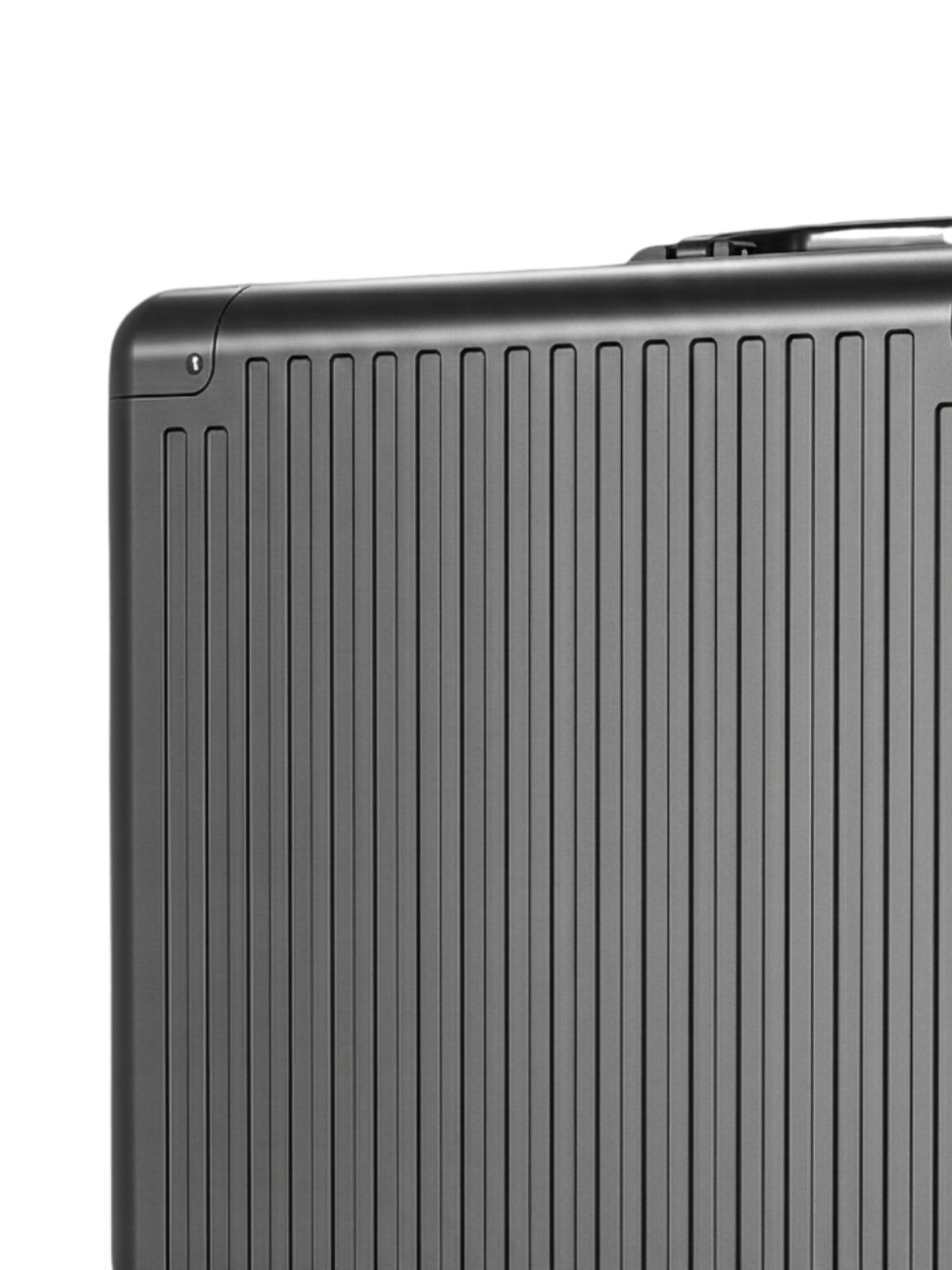 Black suitcase with a ribbed texture on a white background